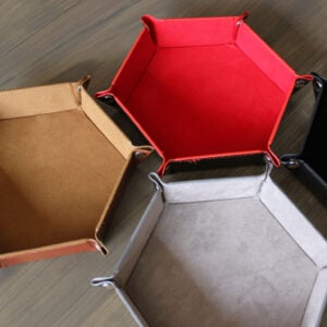 Hexagon snapping dice trays featuring brown, red, grey, and black