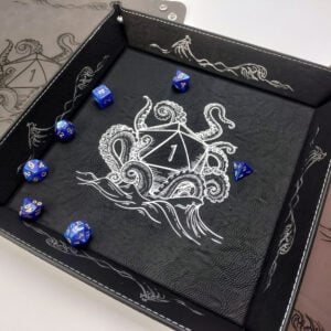 Dice tray with image of a kraken pulling d20 down into the sea
