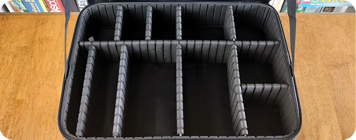 Empty case with rigid dividers and walls