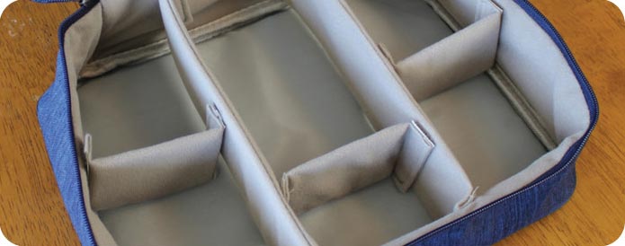 Open bag with dividers set at different size to show its modularity