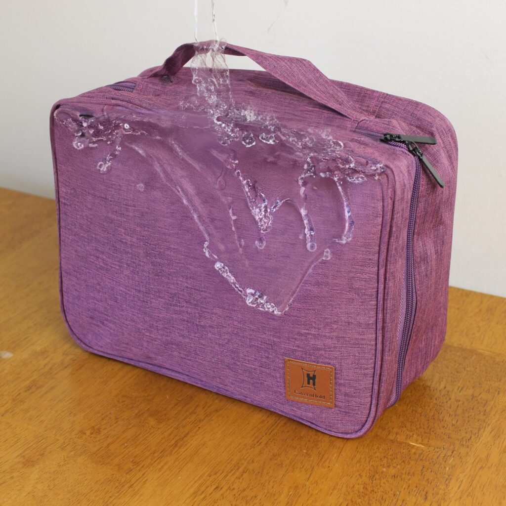 Water splashing onto purple bag
